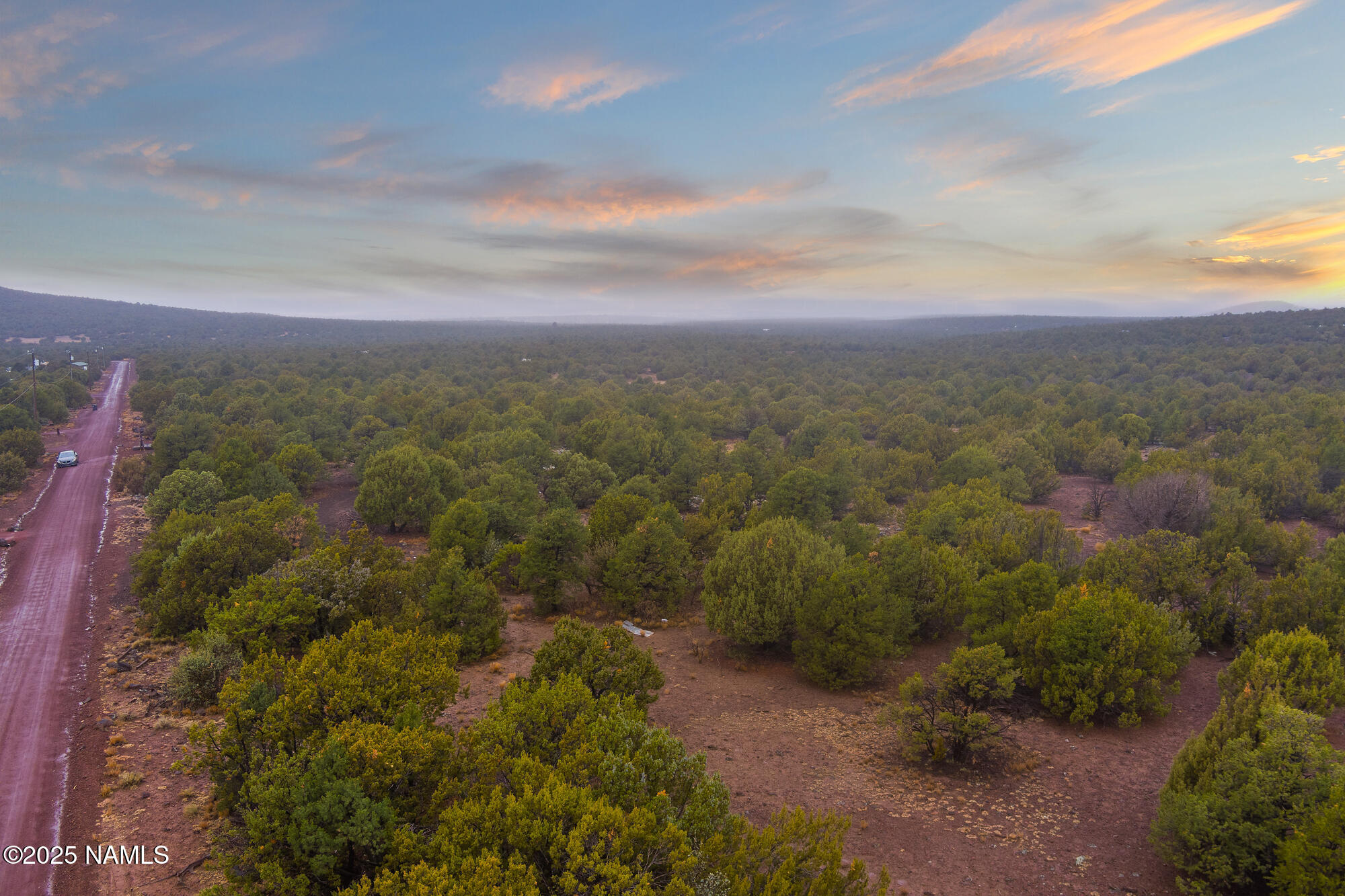 2409 East New Moon Way Williams, AZ 86046 - Photo 11 of 33 a view of a city with lush green forest