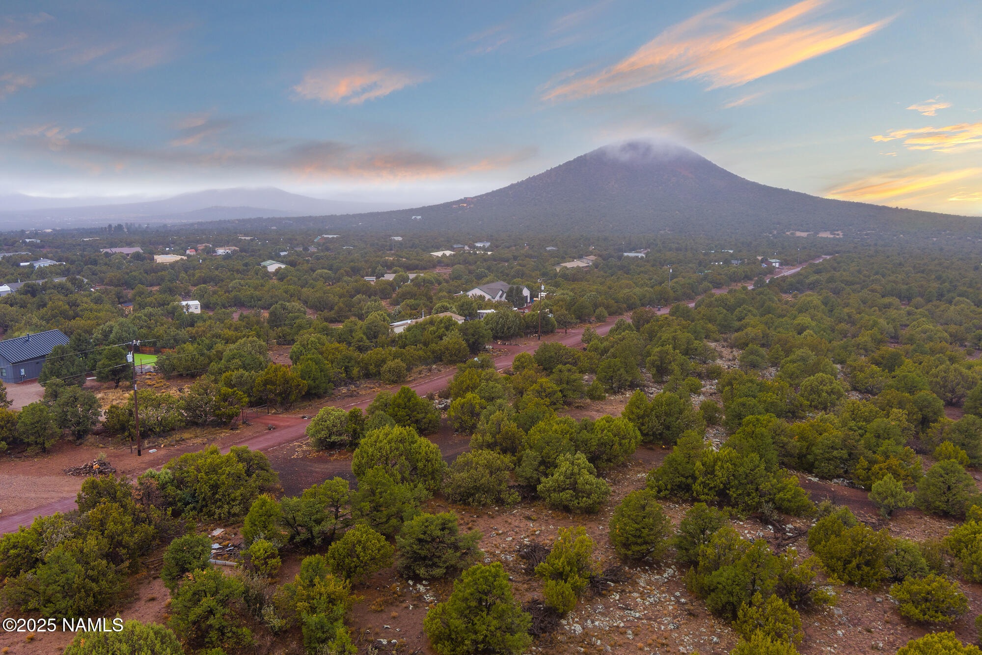 2409 East New Moon Way Williams, AZ 86046 - Photo 13 of 33 an aerial view of residential houses with outdoor space and trees