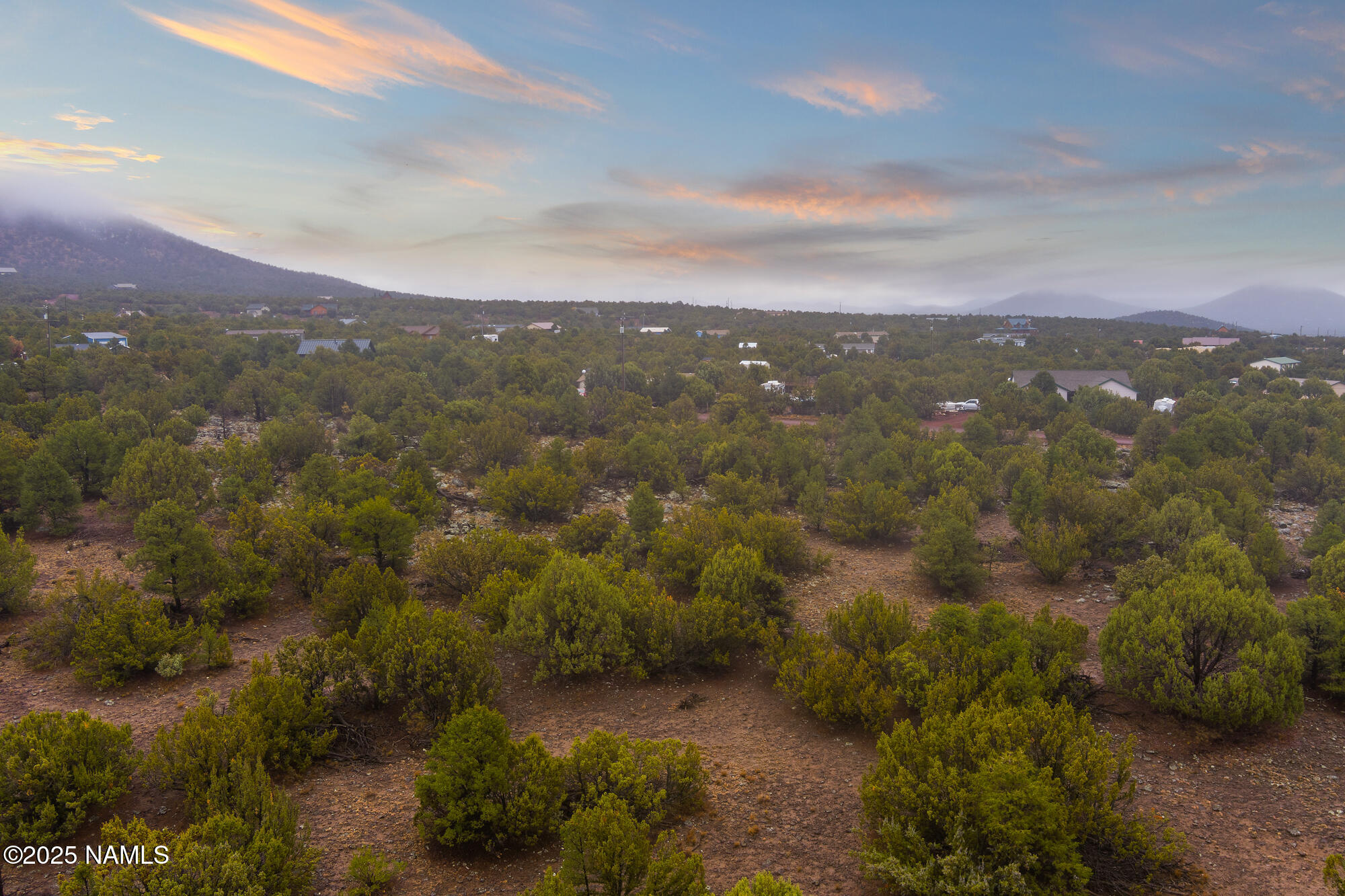 2409 East New Moon Way Williams, AZ 86046 - Photo 8 of 33 a view of a city with lush green forest