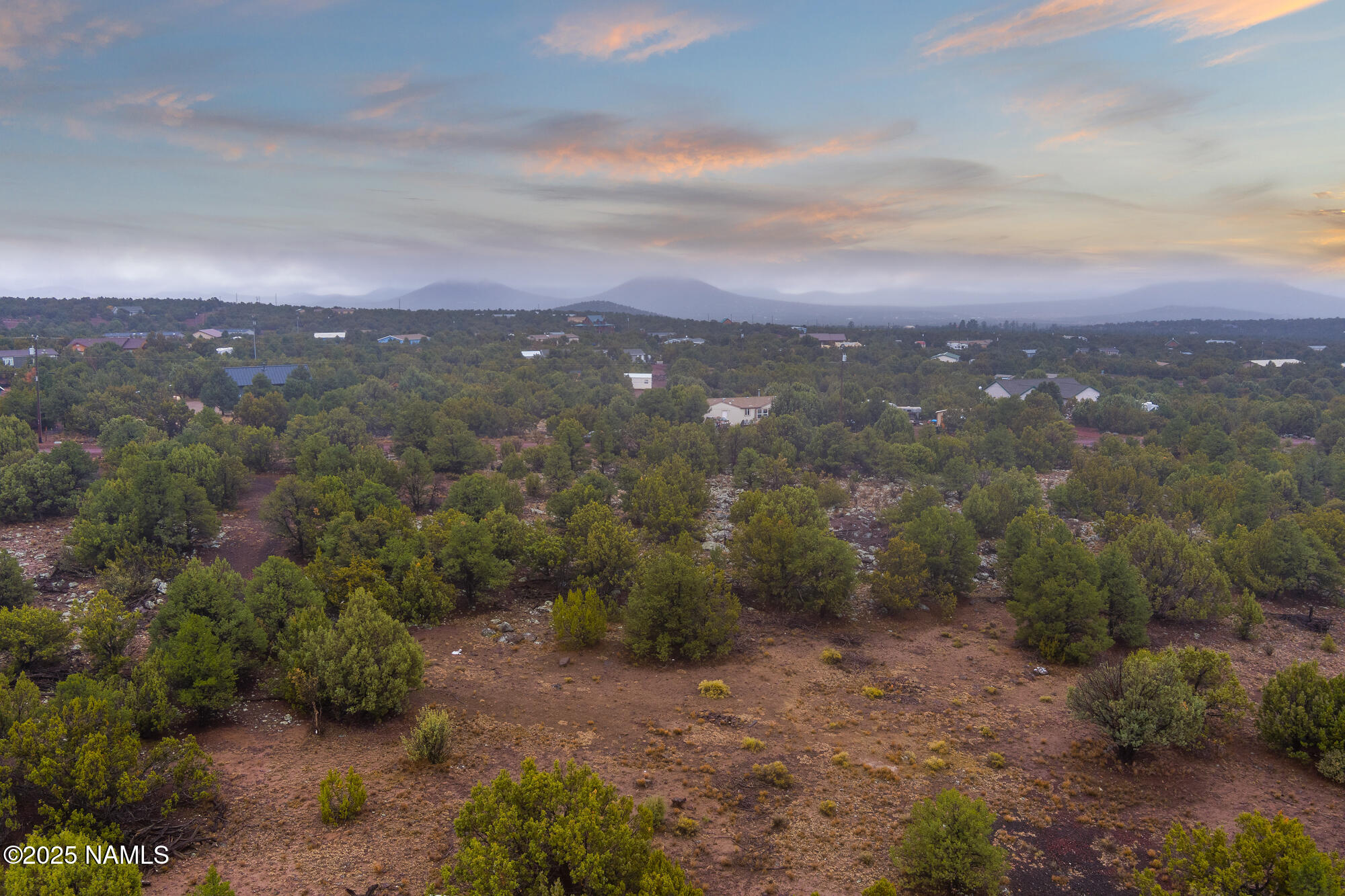 2409 East New Moon Way Williams, AZ 86046 - Photo 9 of 33 a view of a city with lush green forest