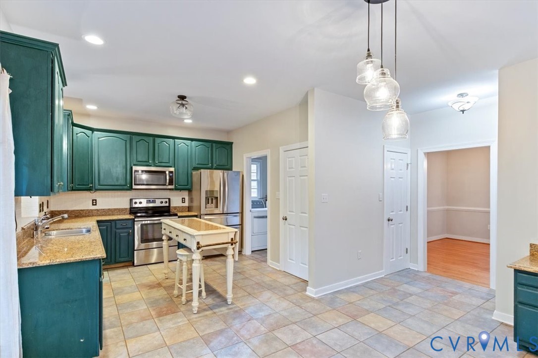 17595 Circuit Rider Drive Beaverdam, VA 23015 - Photo 11 of 29 a view of kitchen with sink refrigerator and microwave