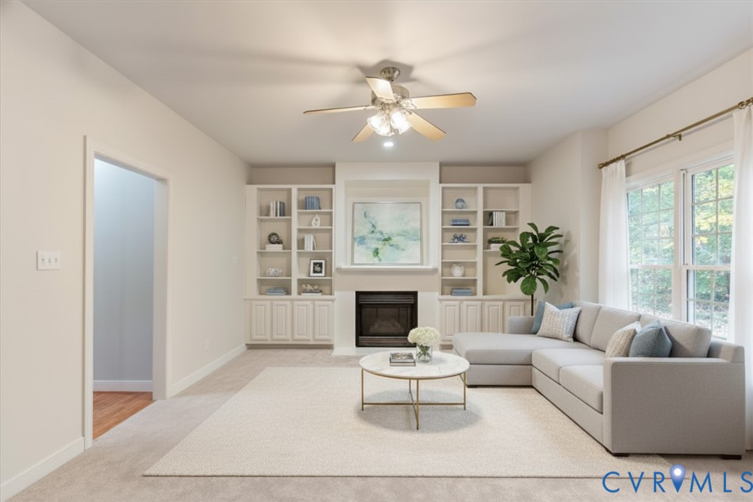 17595 Circuit Rider Drive Beaverdam, VA 23015 - Photo 13 of 29 a living room with furniture a fireplace and a large window