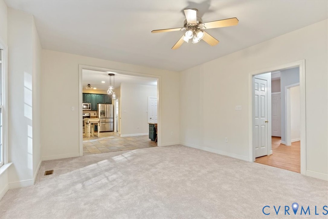 17595 Circuit Rider Drive Beaverdam, VA 23015 - Photo 14 of 29 an empty room with closet and a ceiling fan