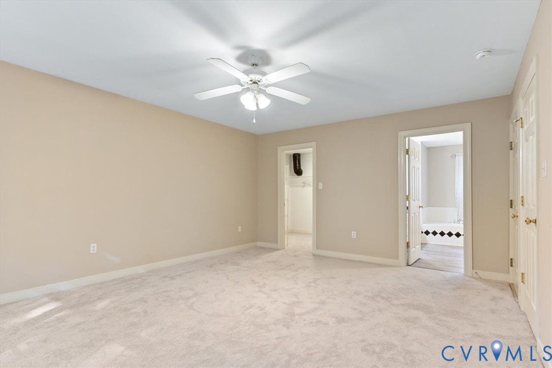 17595 Circuit Rider Drive Beaverdam, VA 23015 - Photo 20 of 29 an empty room with closet and fan