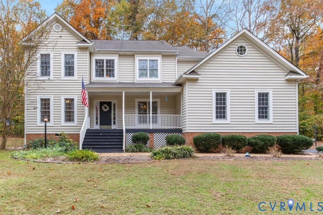 17595 Circuit Rider Drive Beaverdam, VA 23015 - Photo 2 of 29 a front view of a house with garden
