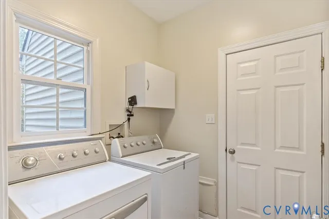 a view of utility room with washer and dryer