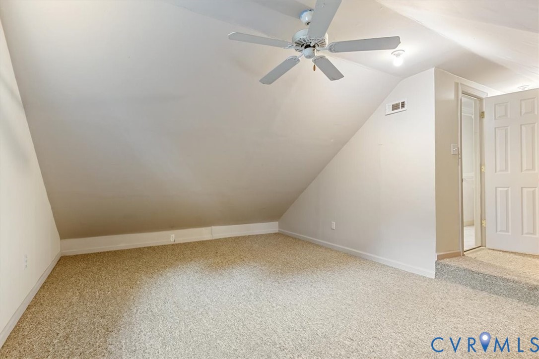 17595 Circuit Rider Drive Beaverdam, VA 23015 - Photo 28 of 29 an empty room with a ceiling fan and carpet