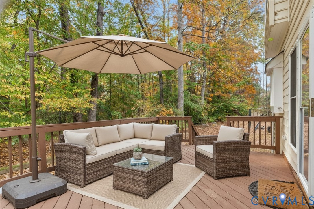 17595 Circuit Rider Drive Beaverdam, VA 23015 - Photo 5 of 29 a view of a patio with couches table and chairs