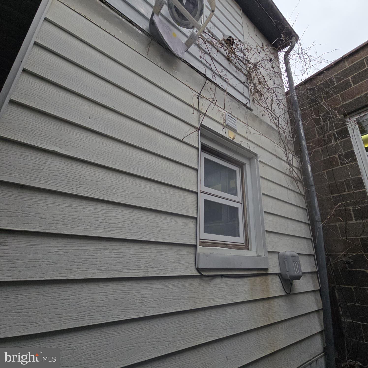 343 Chestnut Street Reading, PA 19602 - Photo 15 of 16 a front view of a house with a window