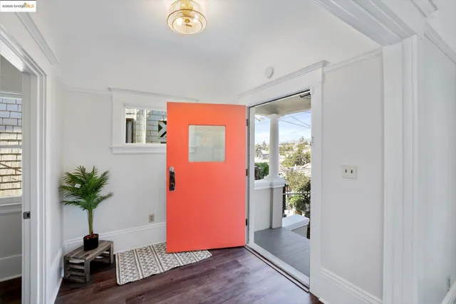 a room with window and wooden floor