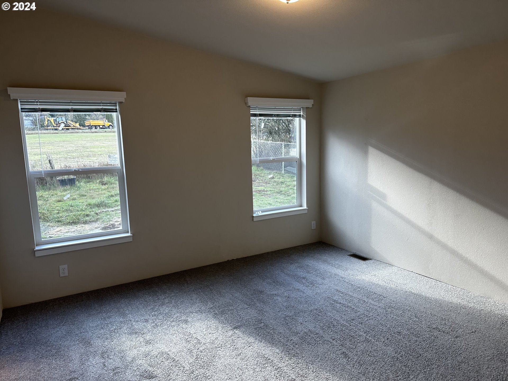 644 Main Street Yoncalla, OR 97499 - Photo 21 of 29 an empty room with windows