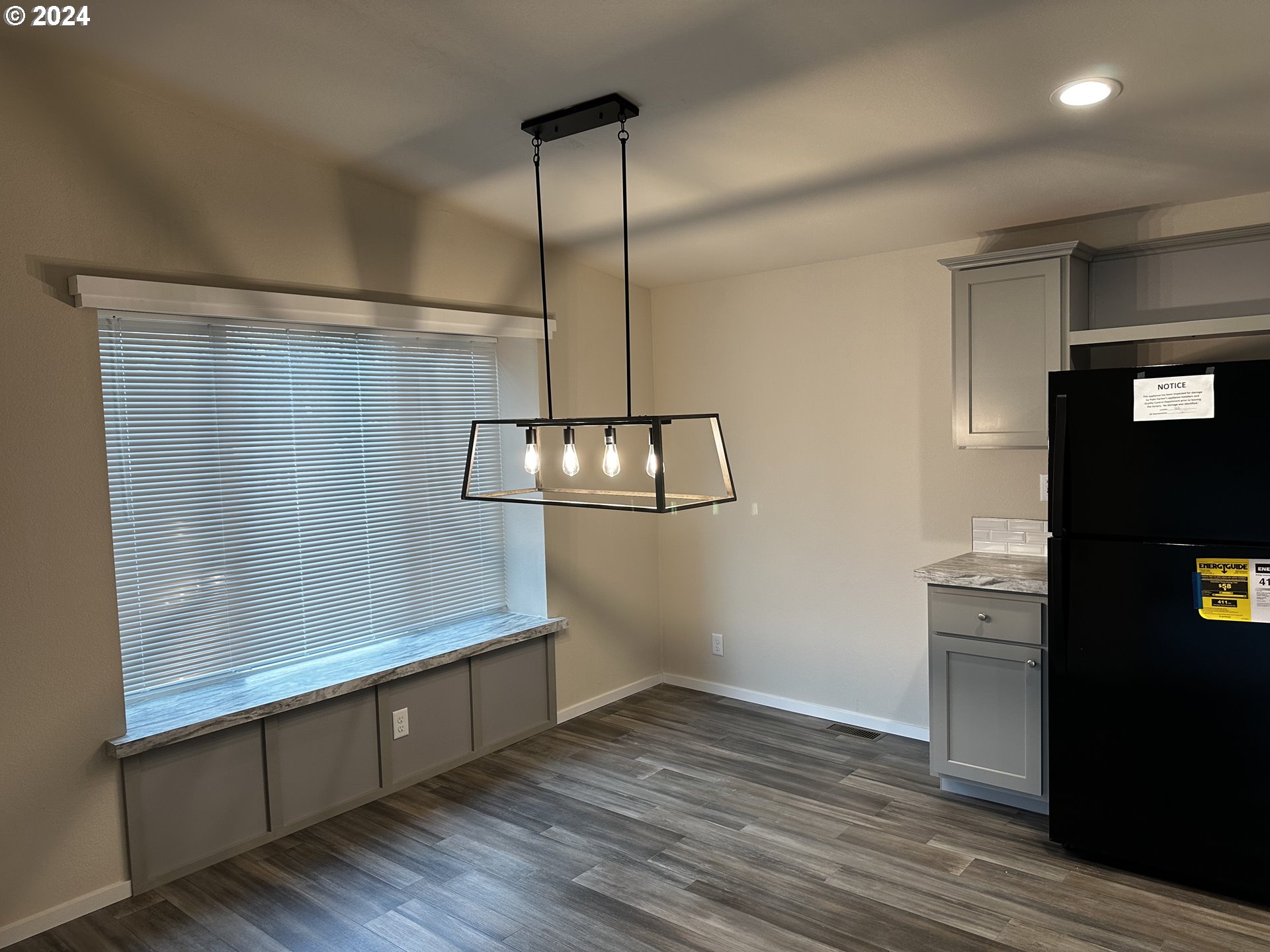 644 Main Street Yoncalla, OR 97499 - Photo 9 of 29 a kitchen with kitchen island a counter space a sink and appliances