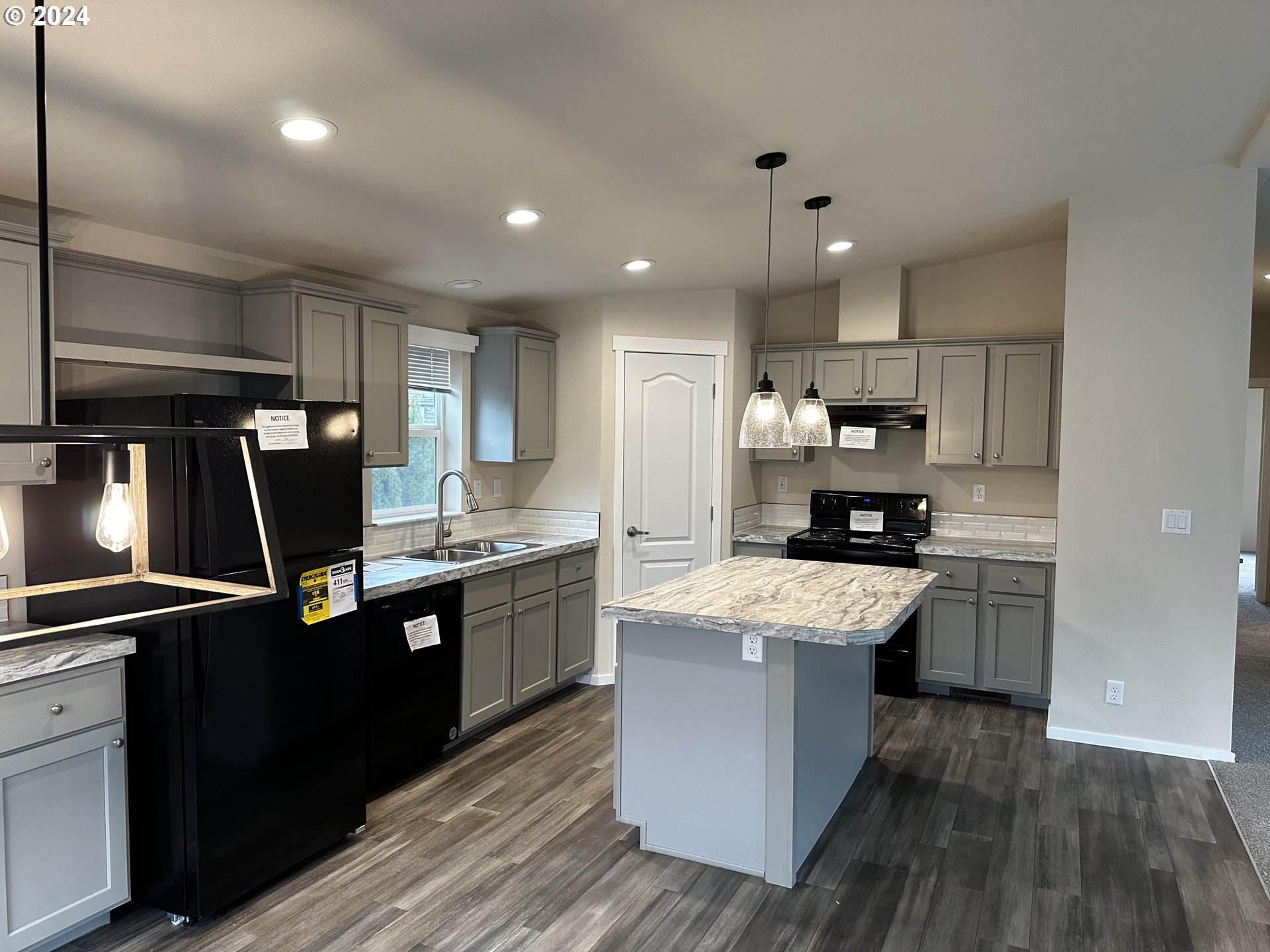644 Main Street Yoncalla, OR 97499 - Photo 10 of 29 a kitchen with stainless steel appliances granite countertop a sink stove and refrigerator