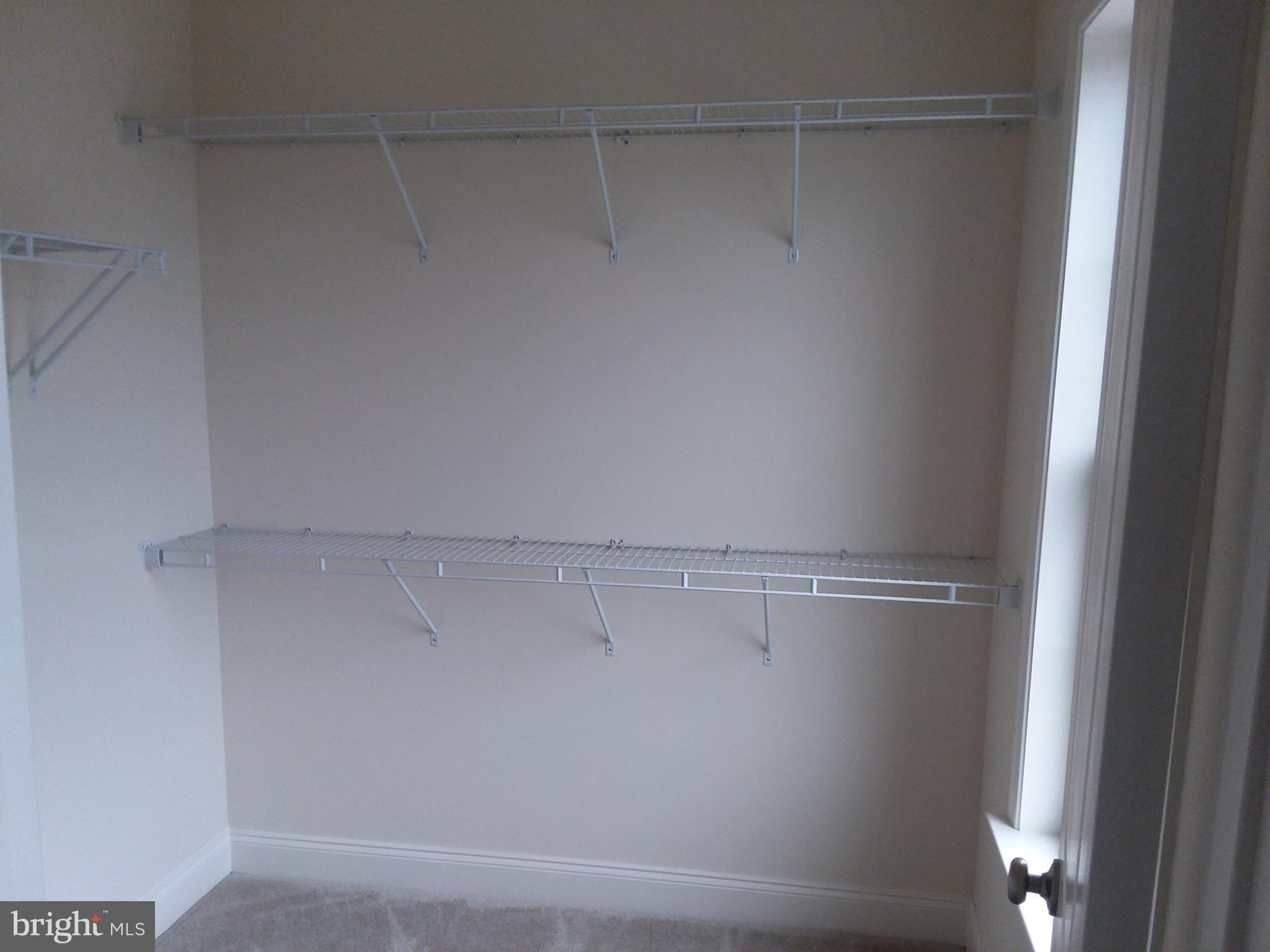 22595 Windsor Locks Square Ashburn, VA 20148 - Photo 26 of 56 a view of a room with racks on the wall