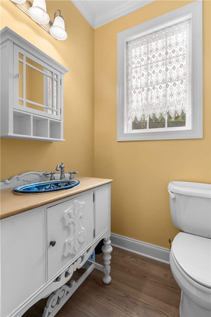 206 Village Way Pendleton, SC 29670 - Photo 12 of 46 A charming powder room on the main level offers unique style with an ornate vanity and decorative basin.