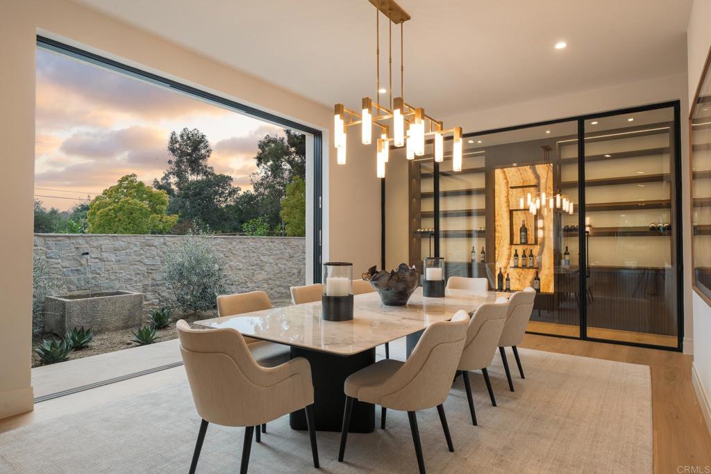 16345 Los Arboles Rancho Santa Fe, CA 92067 - Photo 4 of 17 a view of a dining room with furniture window and outside view