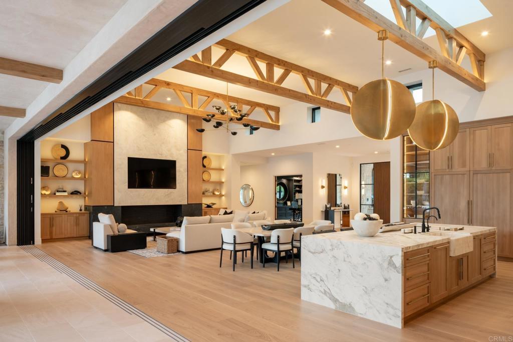 16345 Los Arboles Rancho Santa Fe, CA 92067 - Photo 6 of 17 a living room with furniture and a flat screen tv