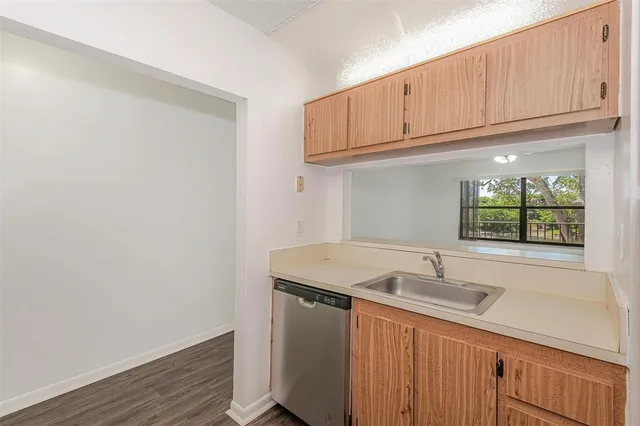 an aerial view of a house with yard swimming pool and outdoor seating
