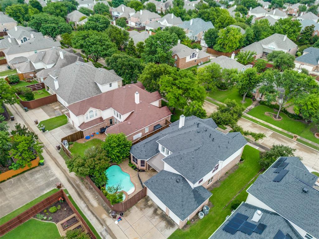 3421 Neiman Road Plano, TX 75025 - Photo 36 of 40 Aerial perspective of suburban area featuring a pool