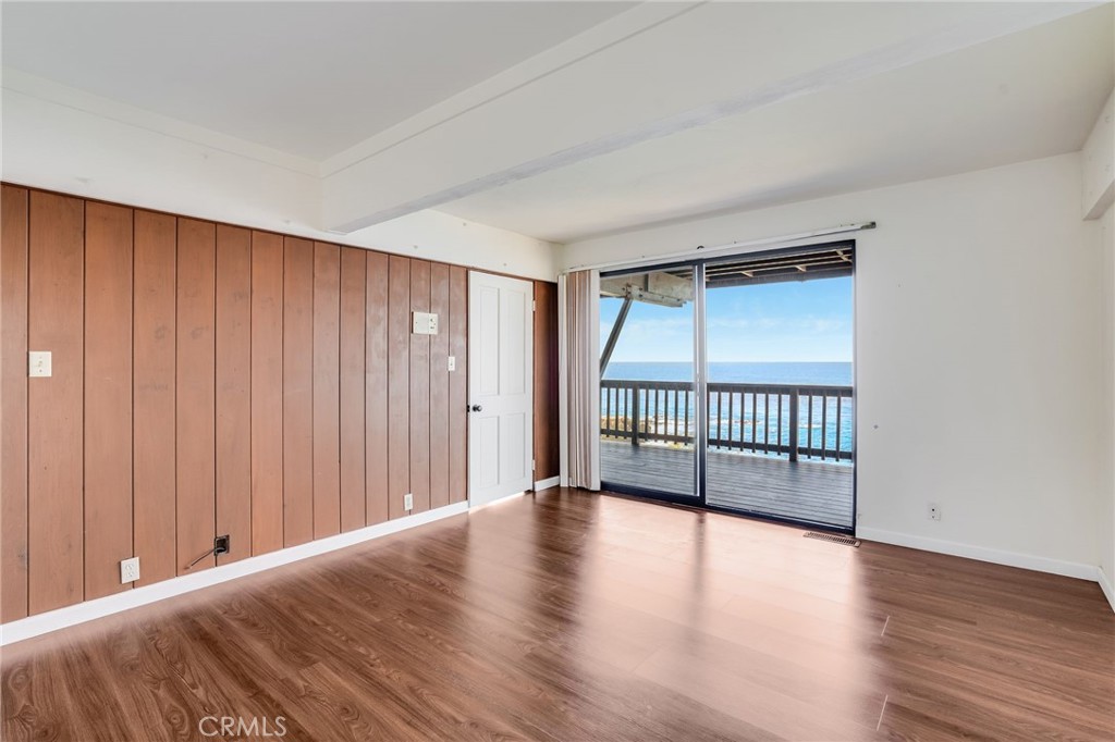 1811 Ocean Way Laguna Beach, CA 92651 - Photo 17 of 28 a view of a room with wooden floor and windows