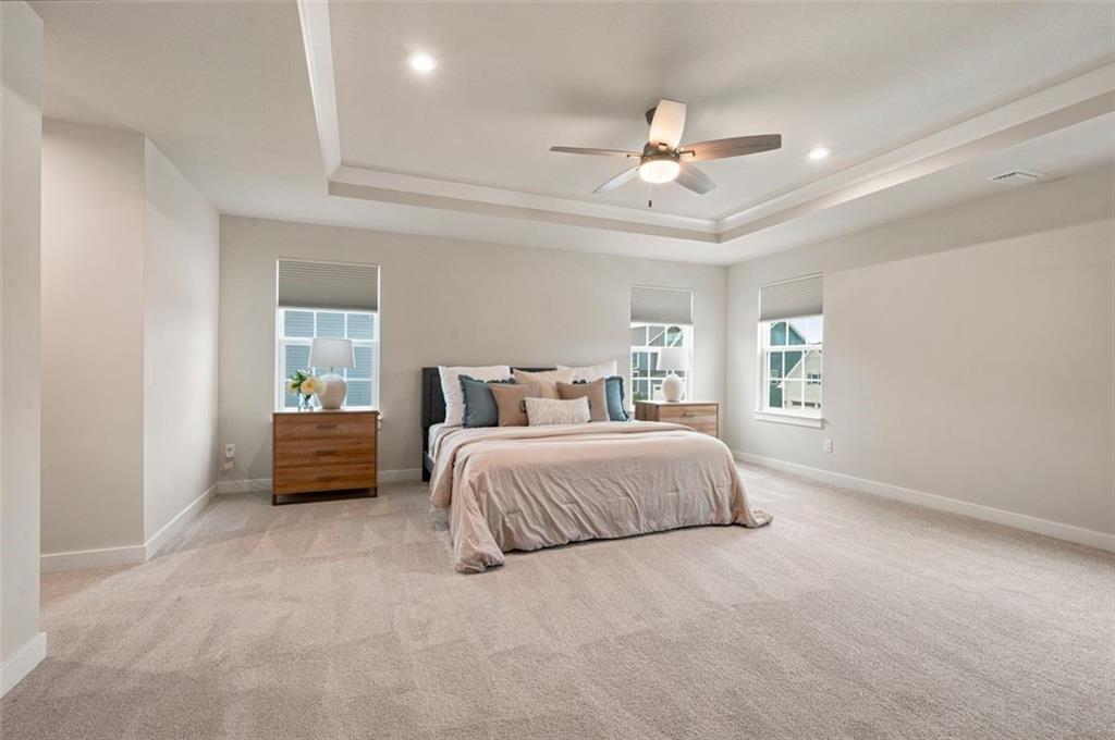 2001 Shelly Lane Mars, PA 16046 - Photo 20 of 39 a spacious bedroom with a bed and a chandelier