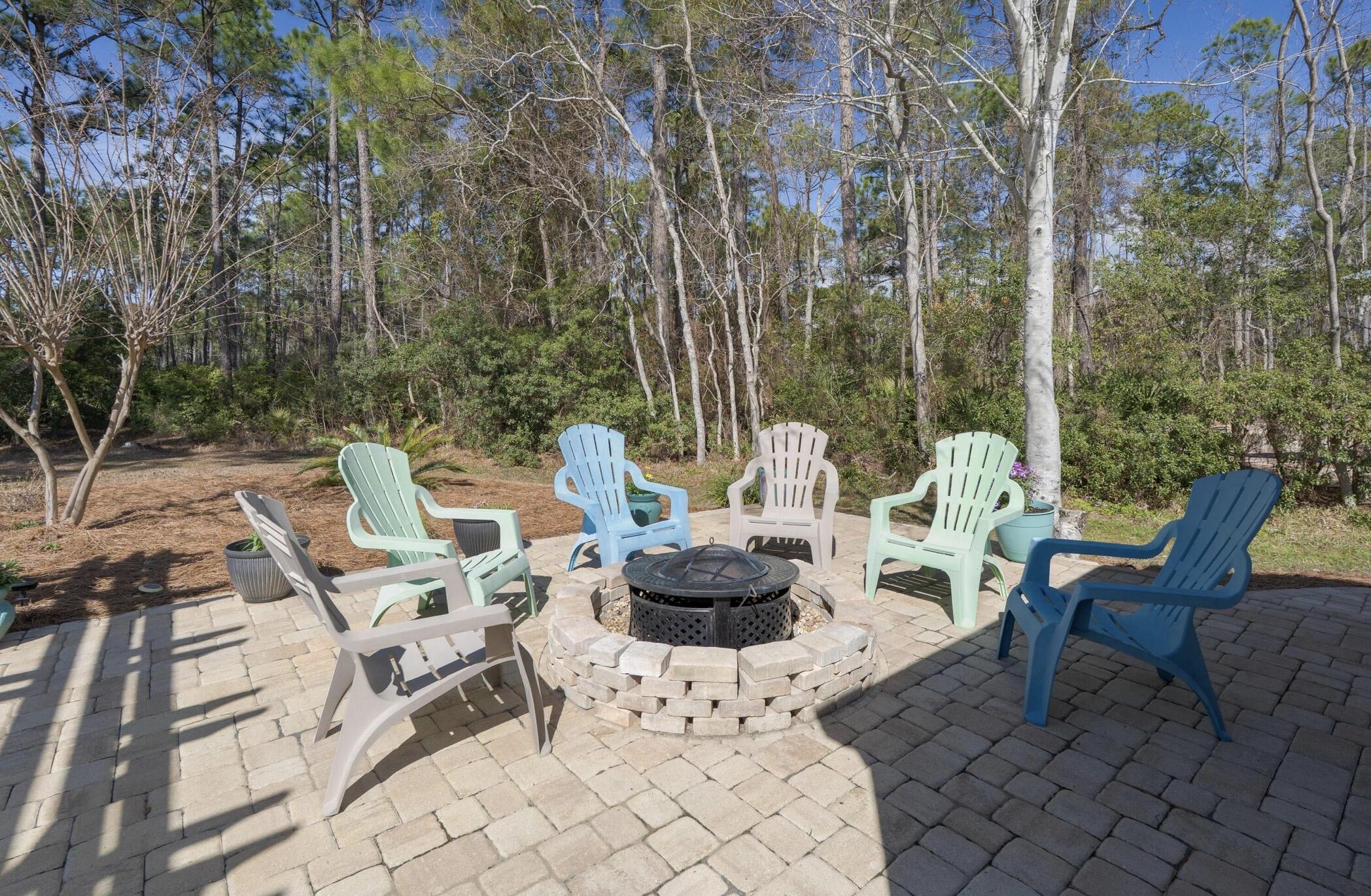 237 Monarch Drive Santa Rosa Beach, FL 32459 - Photo 20 of 30 a view of patio with couple of chairs and couch
