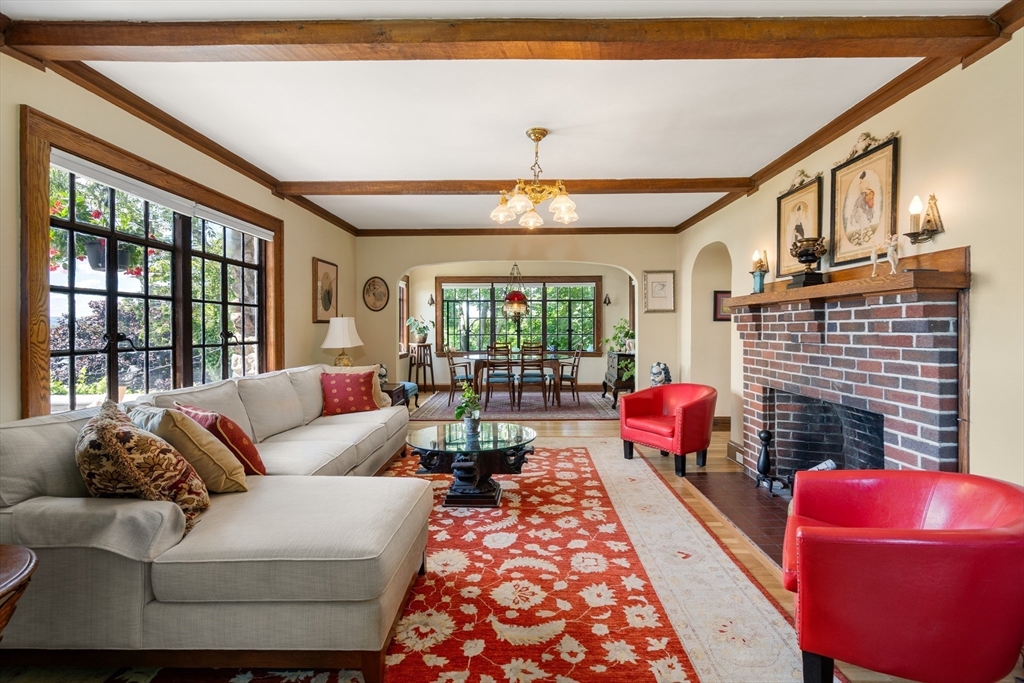 63 Crabtree Road Quincy, MA 02171 - Photo 2 of 41 a living room with furniture fireplace and a large window