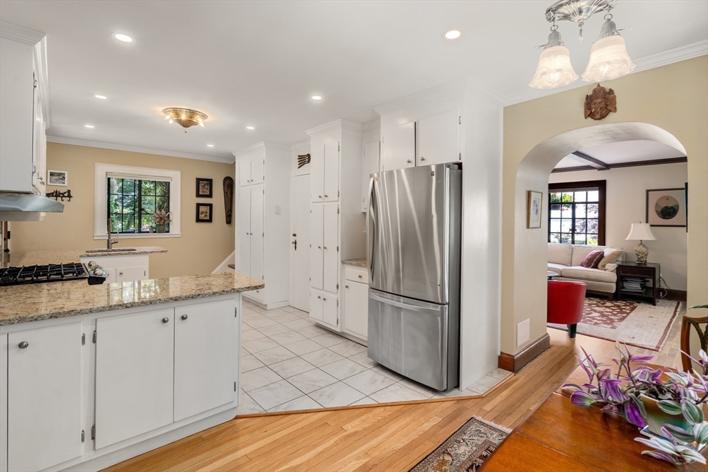 63 Crabtree Road Quincy, MA 02171 - Photo 28 of 41 a kitchen with sink refrigerator and cabinets