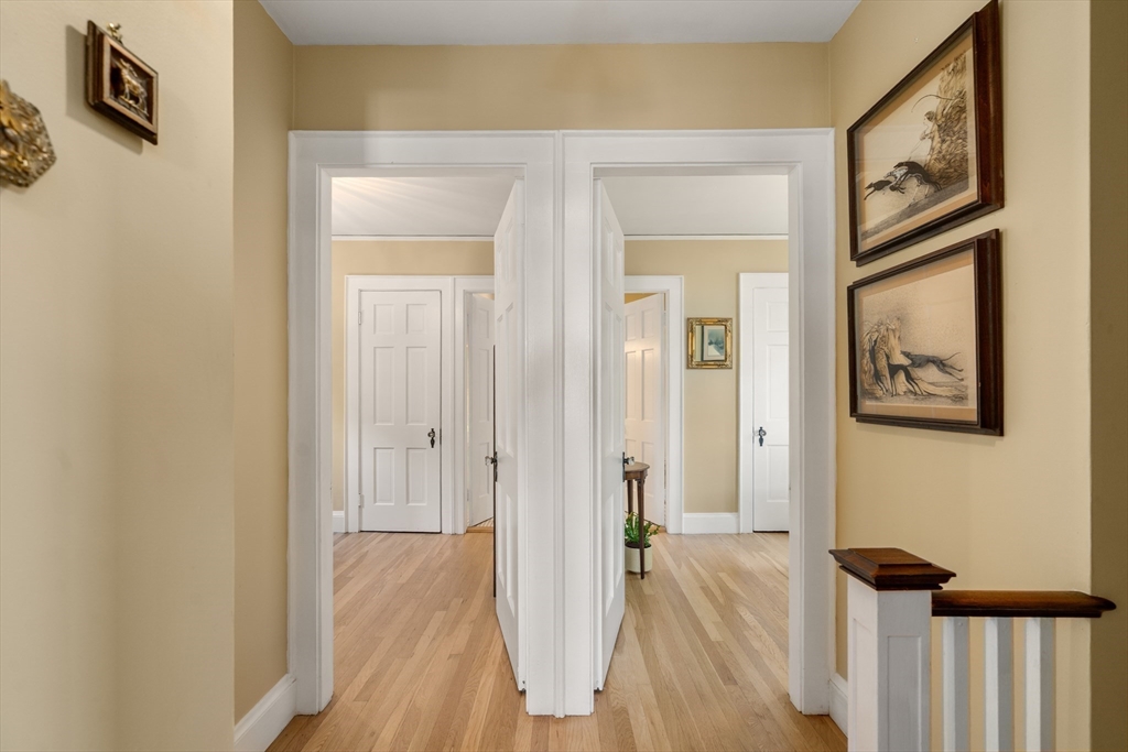 63 Crabtree Road Quincy, MA 02171 - Photo 35 of 41 a view of a hallway with wooden floor and entryway