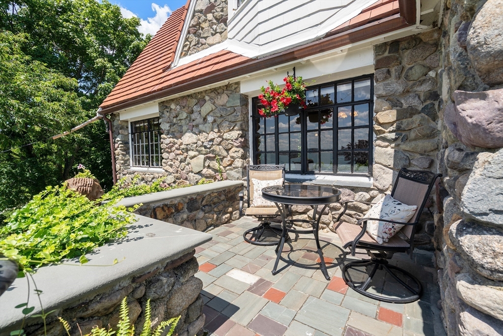 63 Crabtree Road Quincy, MA 02171 - Photo 38 of 41 a patio with table and chairs