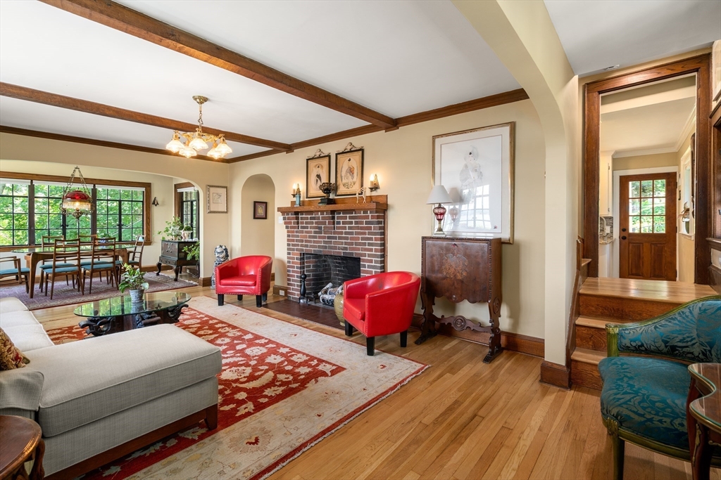 63 Crabtree Road Quincy, MA 02171 - Photo 6 of 41 a living room with furniture fireplace and a large window