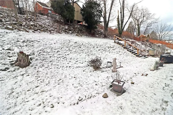 a view of a backyard of snow