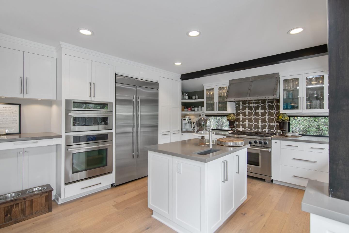 14973 Natalye Road Monte Sereno, CA 95030 - Photo 11 of 31 a kitchen with a sink stainless steel appliances and cabinets