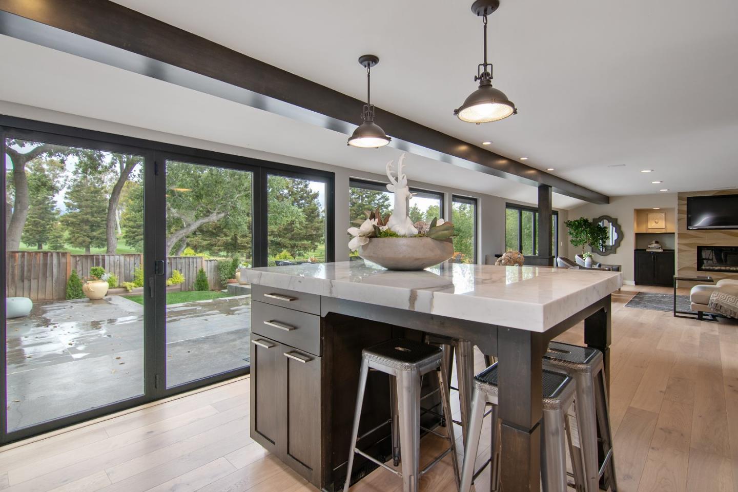 14973 Natalye Road Monte Sereno, CA 95030 - Photo 13 of 31 a kitchen with a counter space a sink and appliances