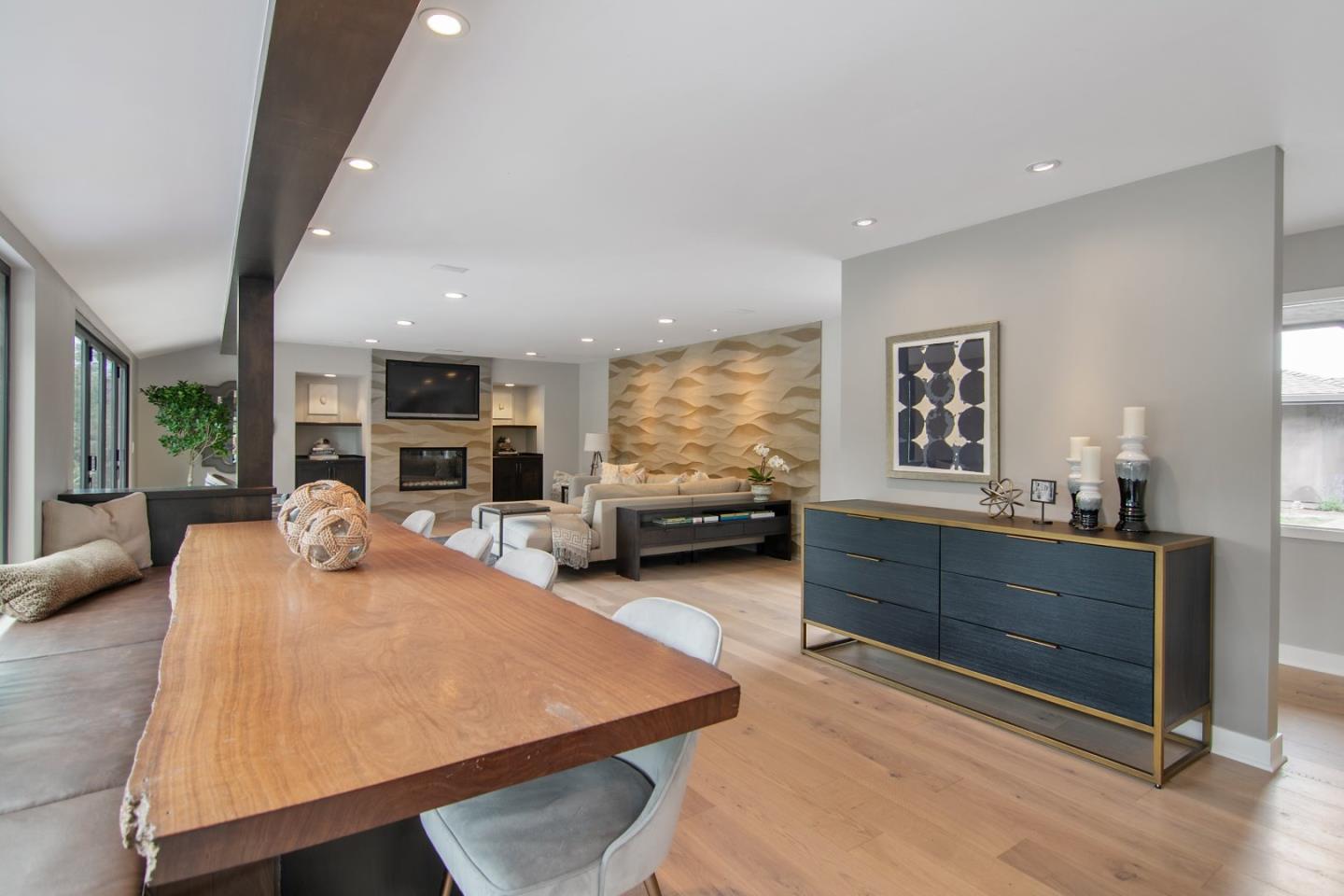 14973 Natalye Road Monte Sereno, CA 95030 - Photo 14 of 31 a dining hall with couches and wooden floor