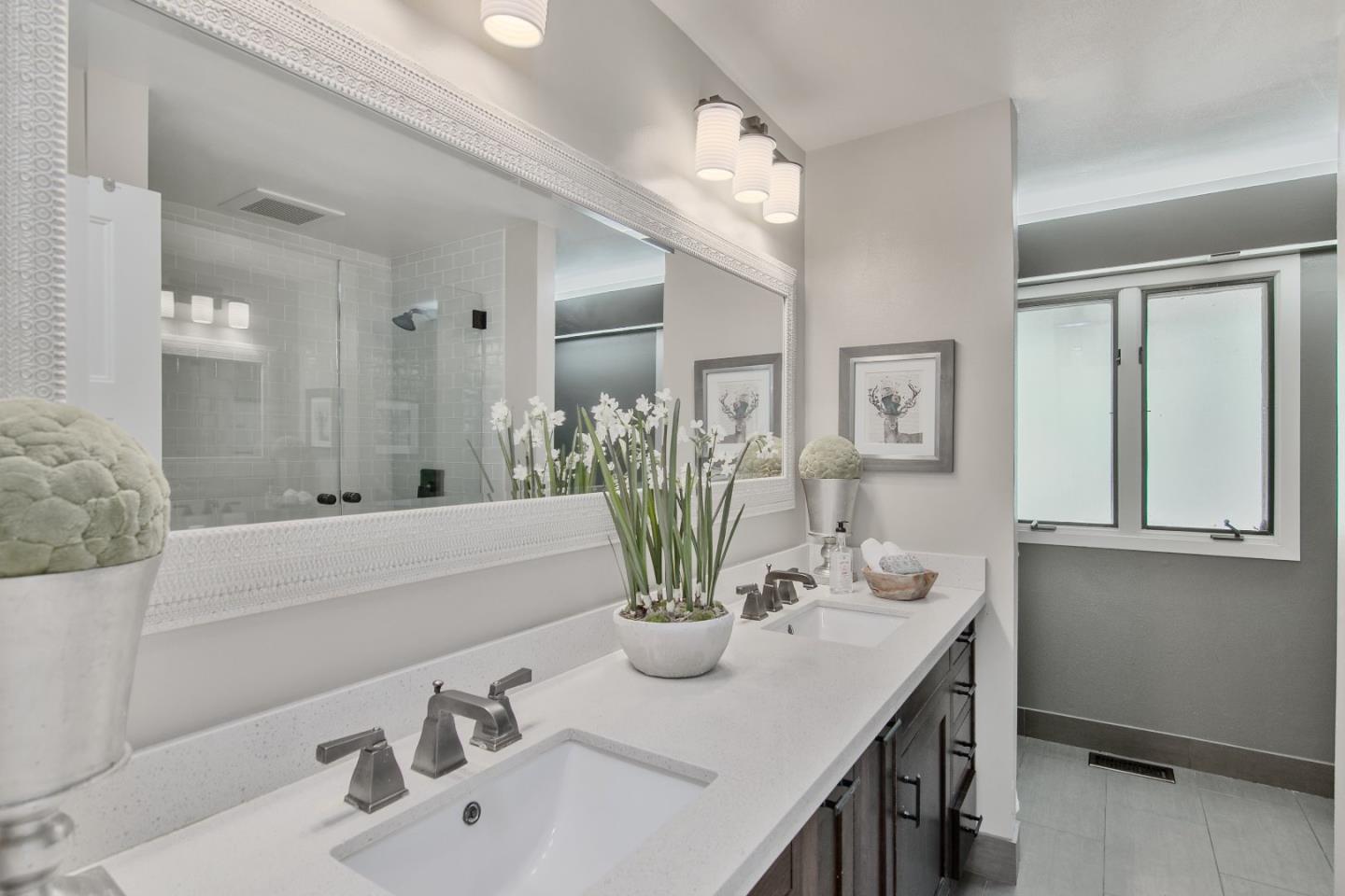 14973 Natalye Road Monte Sereno, CA 95030 - Photo 17 of 31 a bathroom with a sink a tub and a mirror