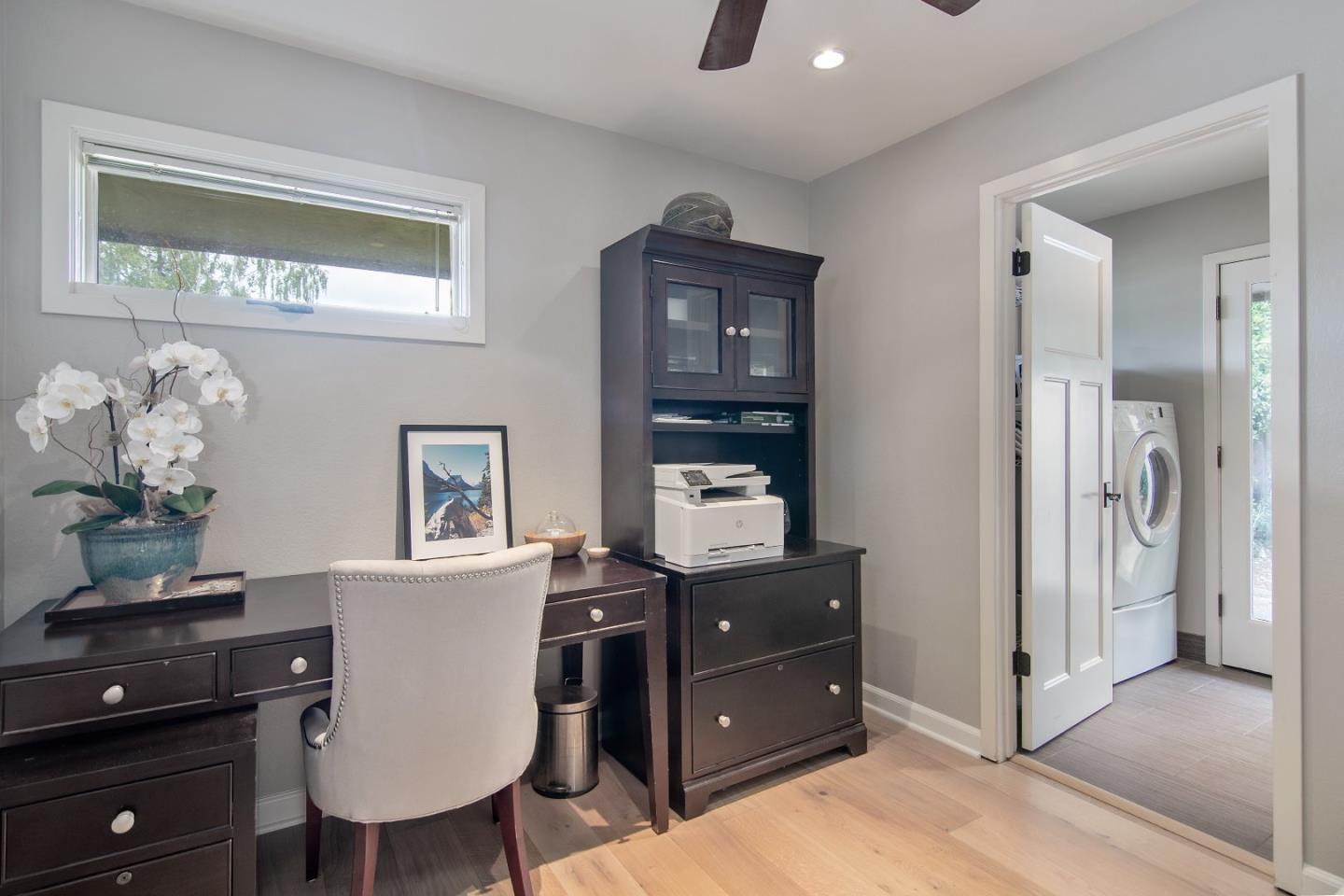 14973 Natalye Road Monte Sereno, CA 95030 - Photo 22 of 31 a living room with furniture and a window