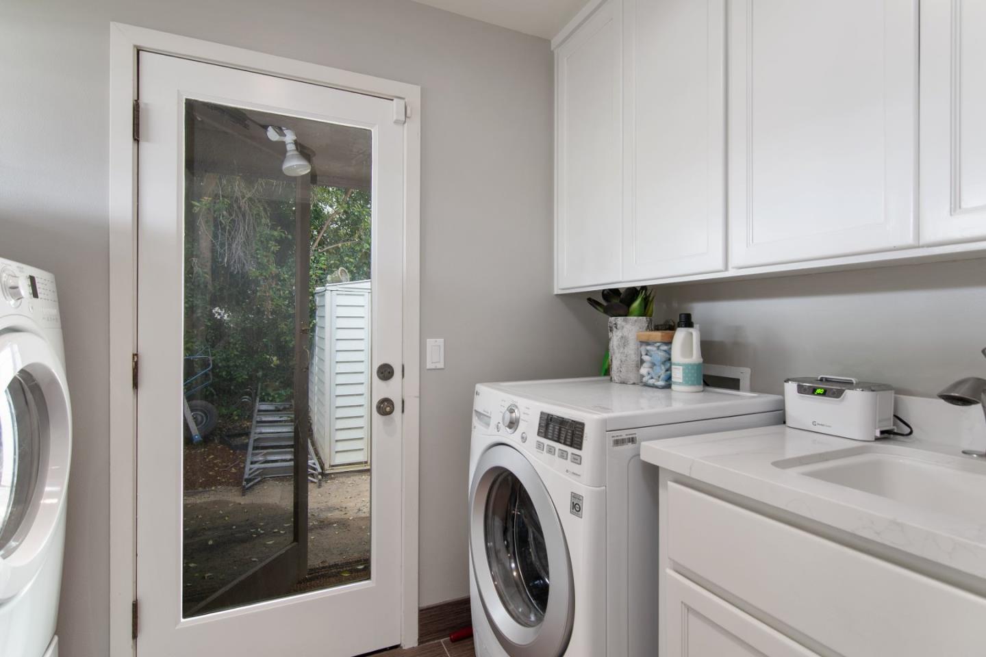 14973 Natalye Road Monte Sereno, CA 95030 - Photo 23 of 31 a utility room with dryer and washer