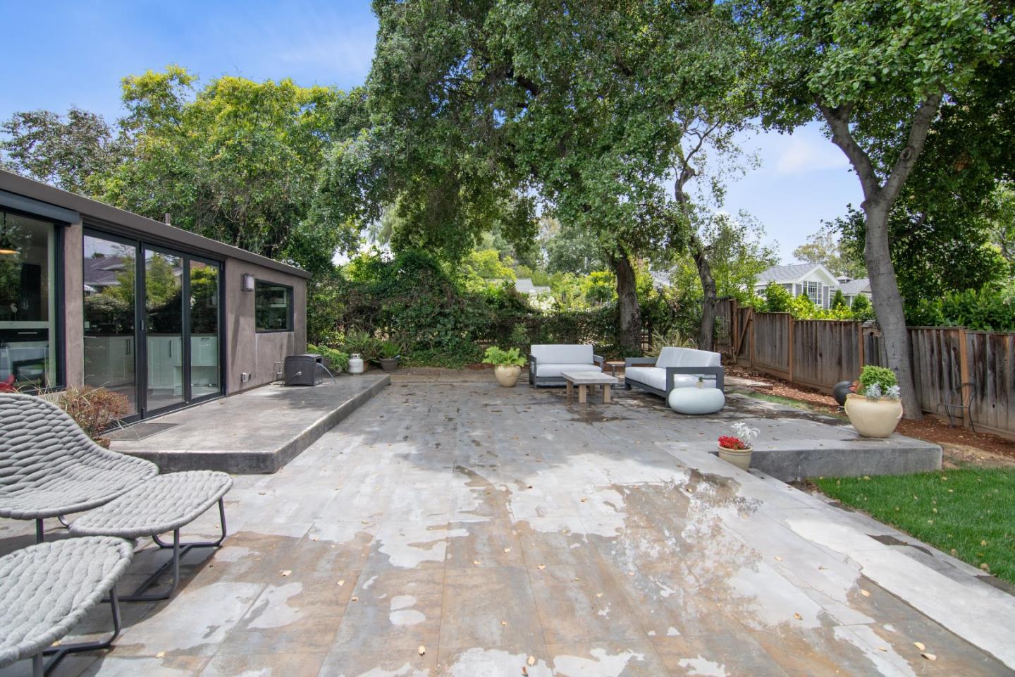 14973 Natalye Road Monte Sereno, CA 95030 - Photo 24 of 31 a view of backyard with outdoor seating and trees