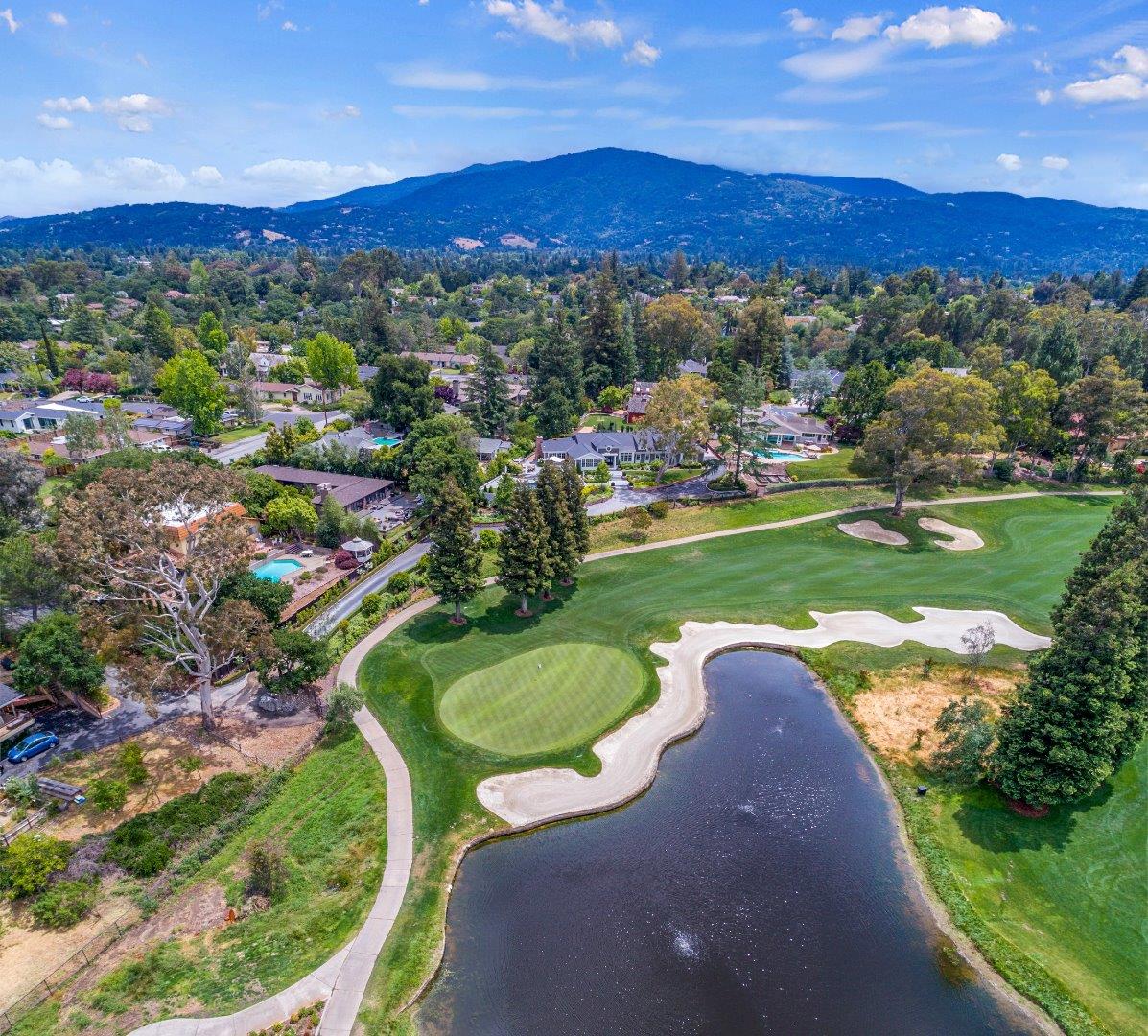 14973 Natalye Road Monte Sereno, CA 95030 - Photo 31 of 31 a view of a golf course with a garden