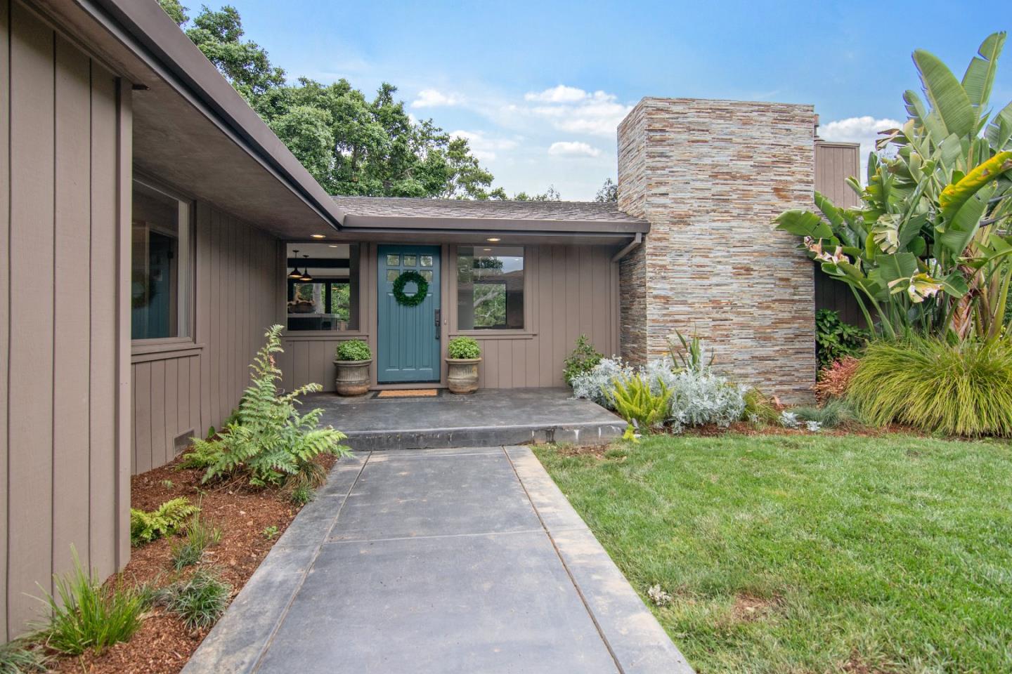 14973 Natalye Road Monte Sereno, CA 95030 - Photo 6 of 31 a front view of a house with garden