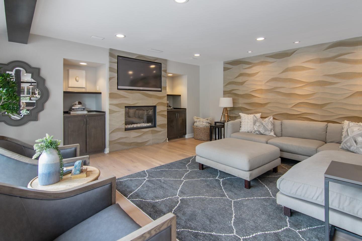 14973 Natalye Road Monte Sereno, CA 95030 - Photo 9 of 31 a living room with furniture and a fireplace