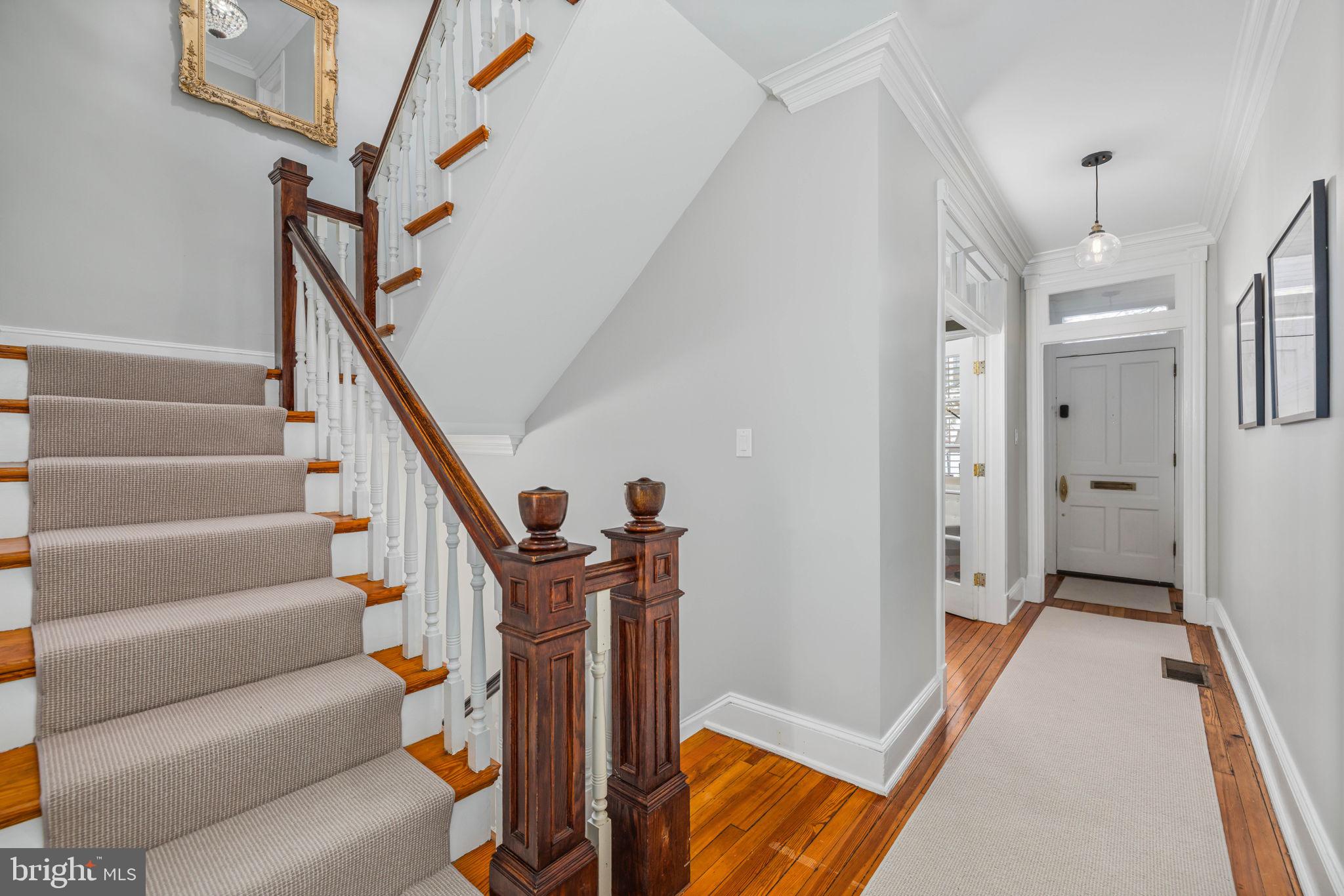 3408 Dent Place Northwest Washington, DC 20007 - Photo 6 of 17 a view of a livingroom with furniture and stairs