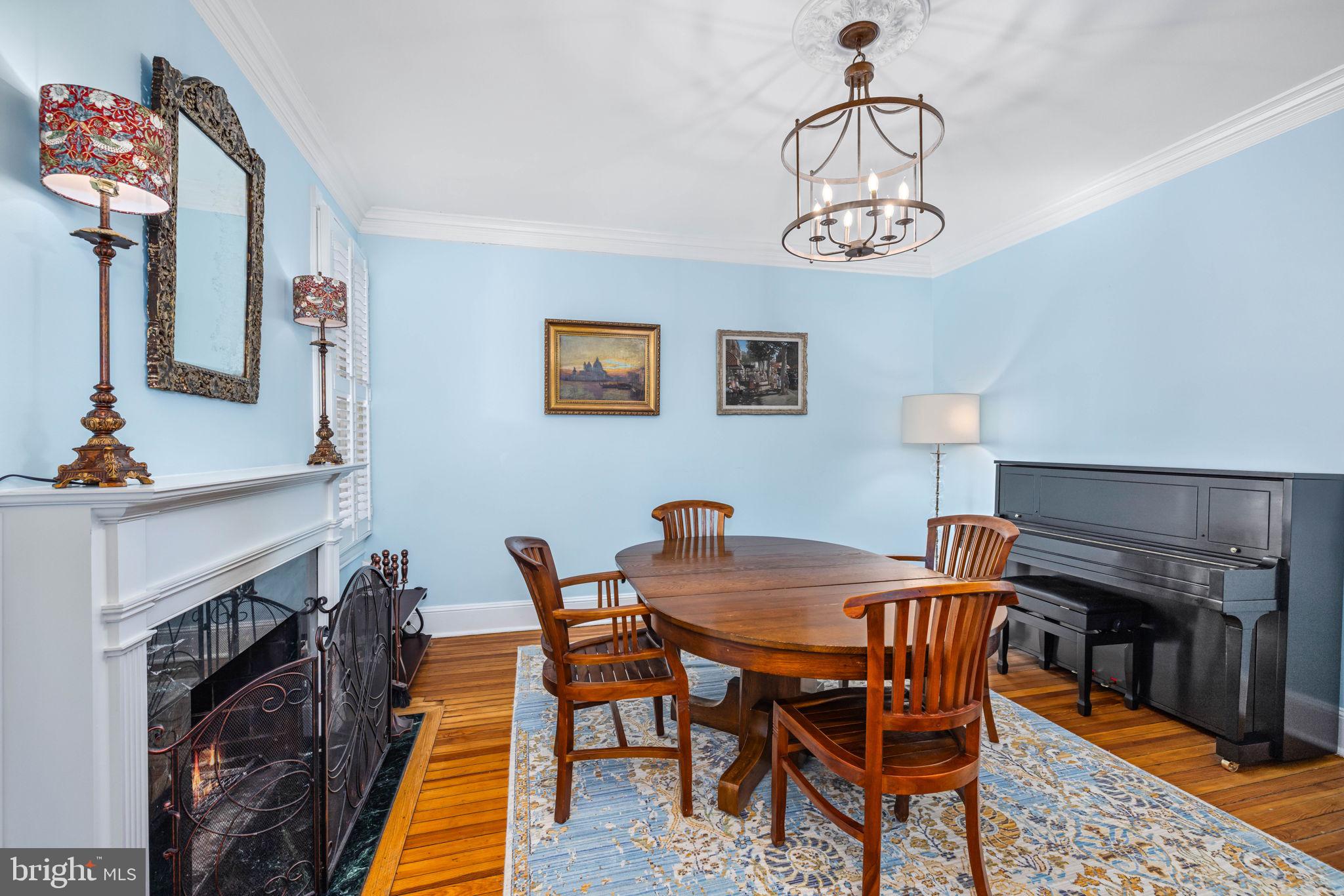 3408 Dent Place Northwest Washington, DC 20007 - Photo 8 of 17 a view of a dining room with furniture and wooden floor
