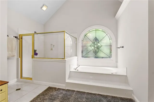 a bedroom with a bed furniture and a window