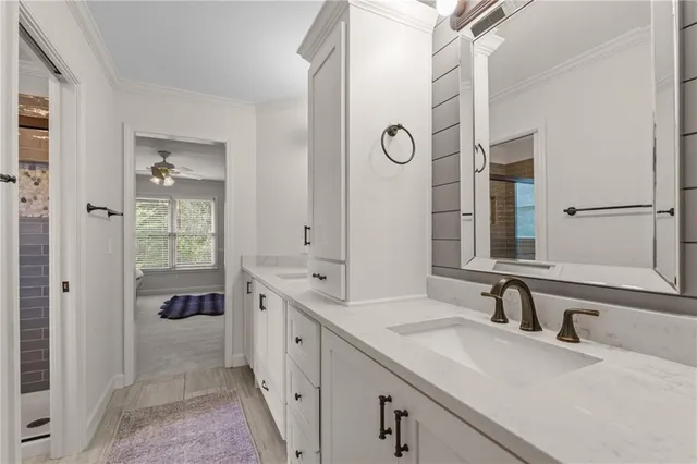 a view of empty room with wooden floor and windows