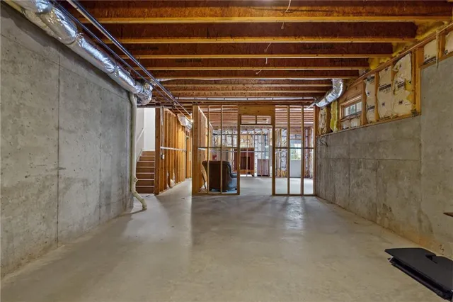 a view of a house with swimming pool and sitting area