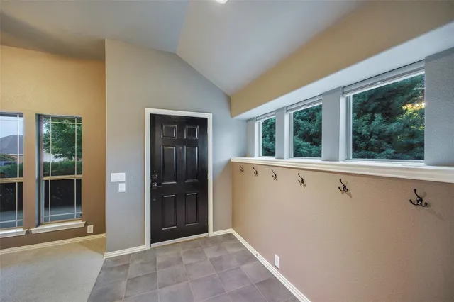 a view of a house with a large window