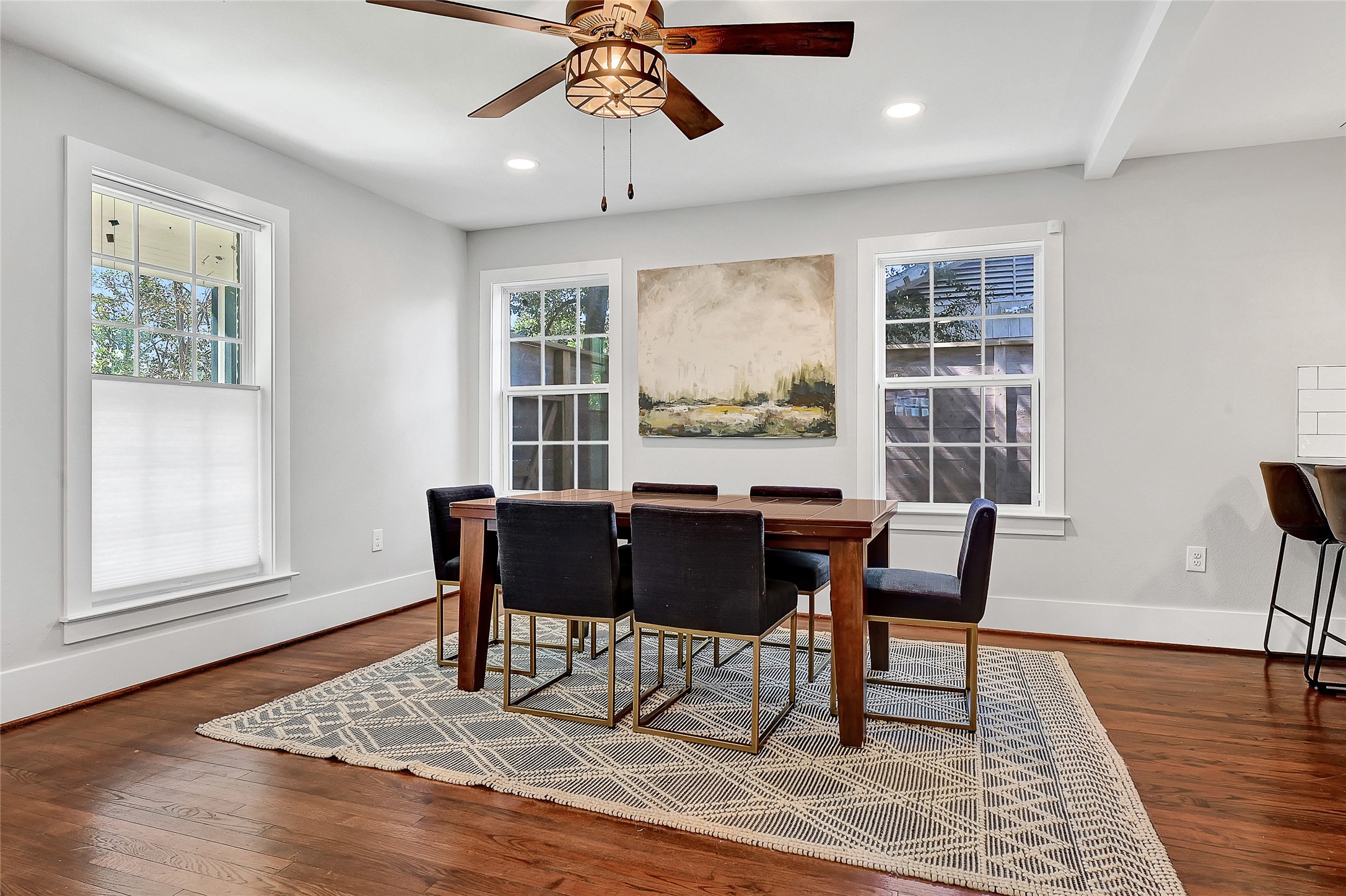3343 Tampa Street Houston, TX 77021 - Photo 5 of 41 a view of a dining room with furniture window and wooden floor