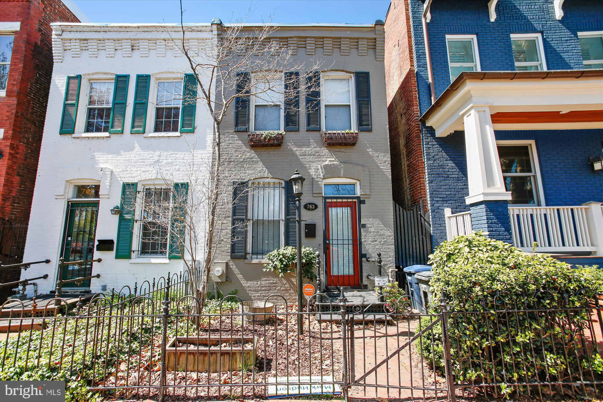 763 10th Street Southeast Washington, DC 20003 - Photo 1 of 20 a view of a brick house with many windows